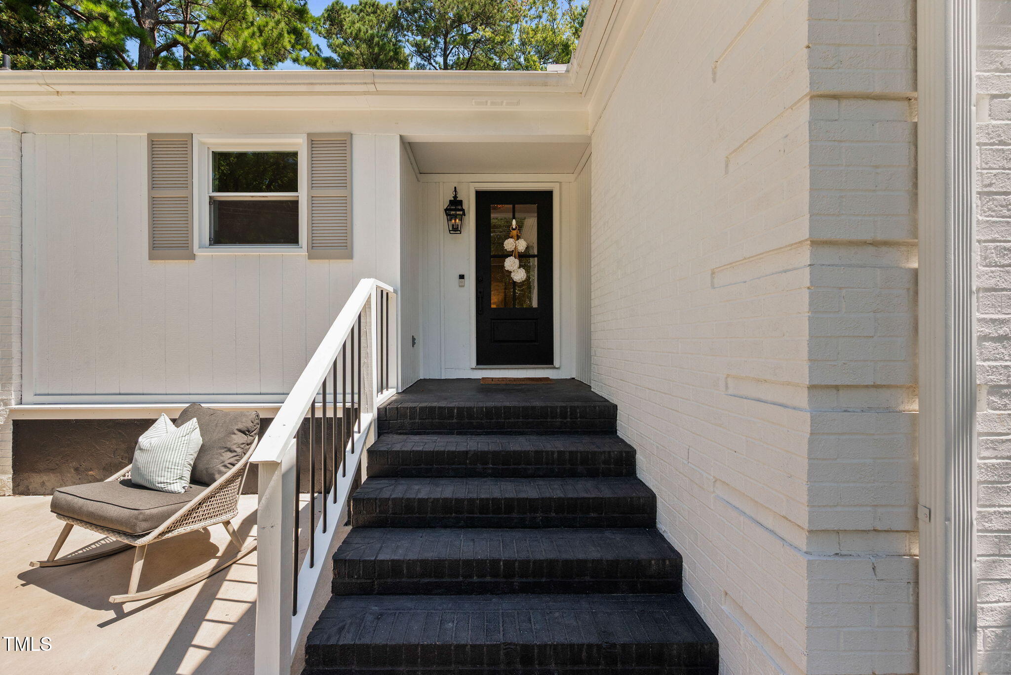 4808 Latimer Road Raleigh, NC 27609 - Photo 5 of 39 a view of entryway and hall with wooden floor