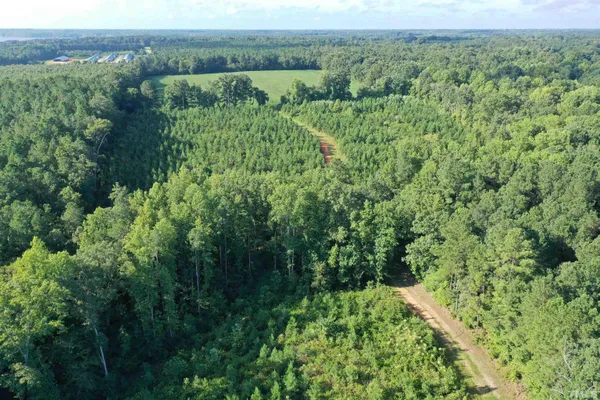 an aerial view of a yard with green space