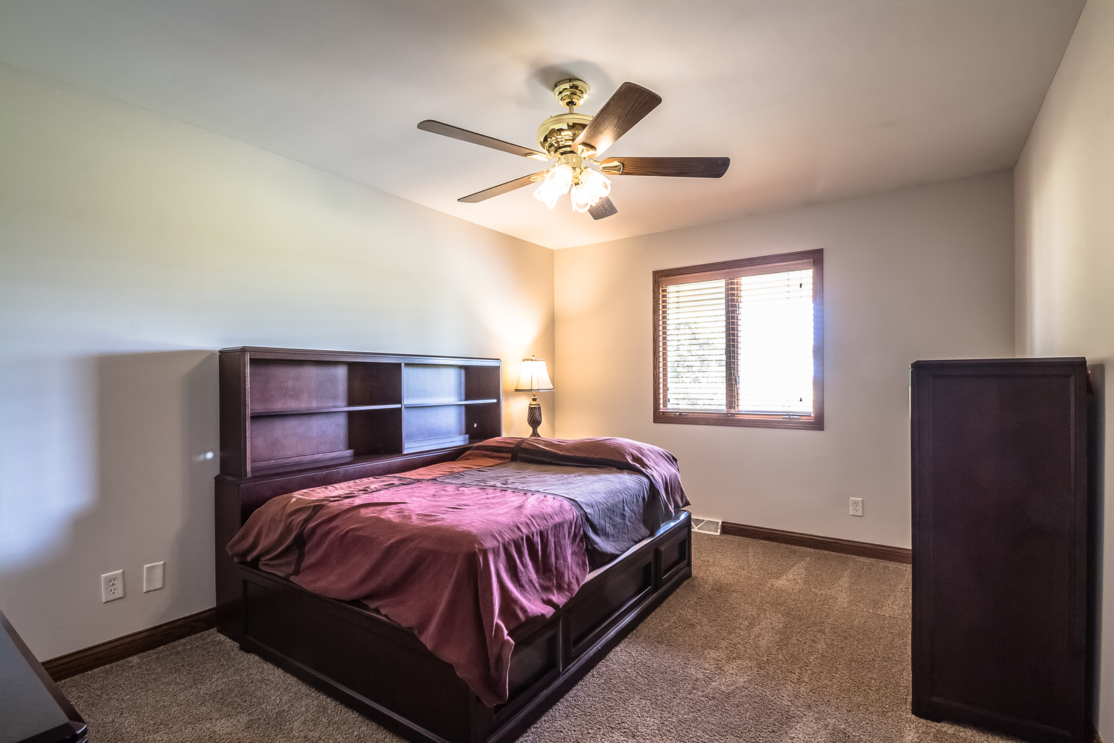 18802 West Manhattan Road Elwood, IL 60421 - Photo 12 of 38 a bedroom with a bed and window