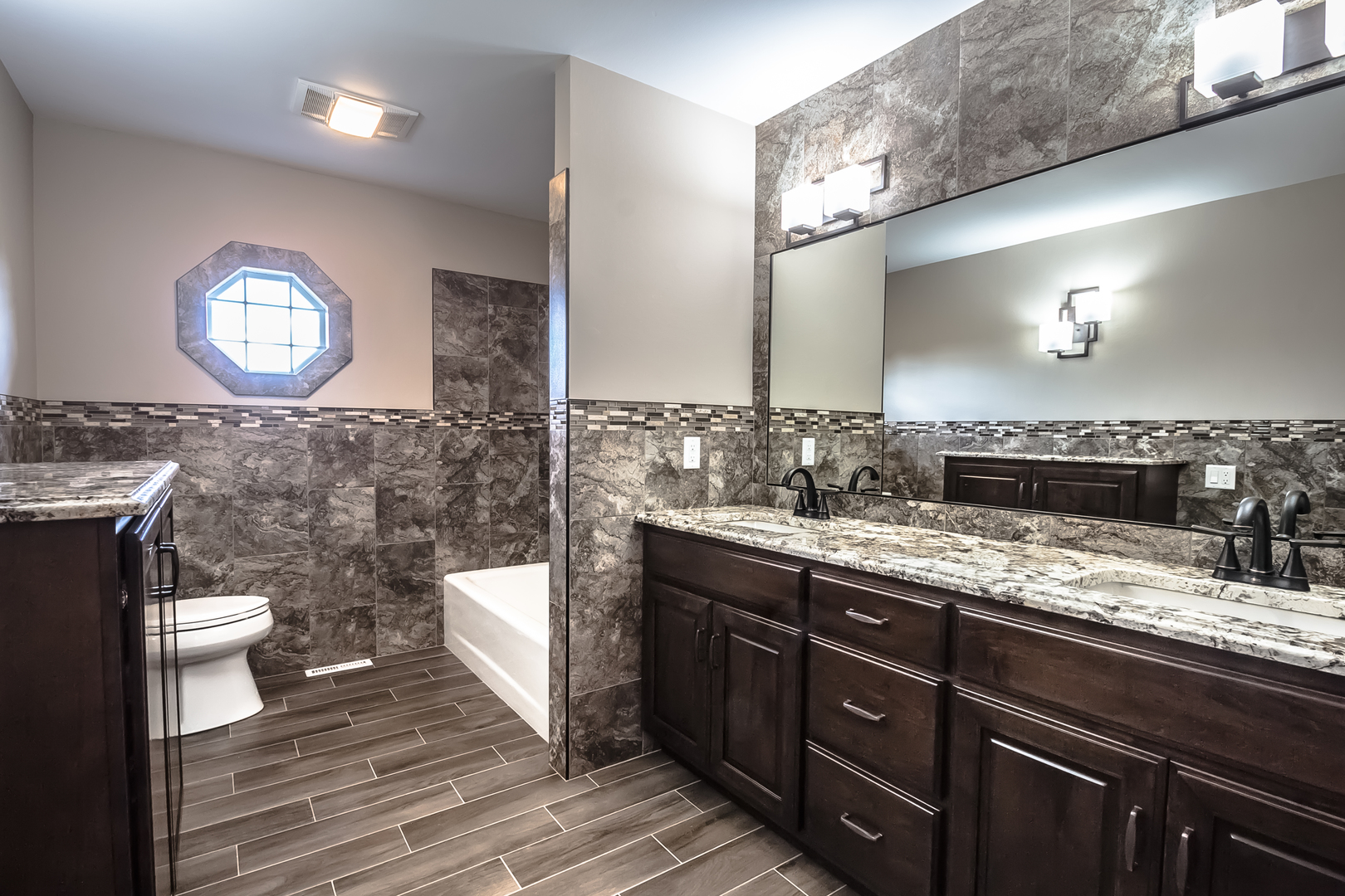 18802 West Manhattan Road Elwood, IL 60421 - Photo 14 of 38 a bathroom with a double vanity sink and a mirror