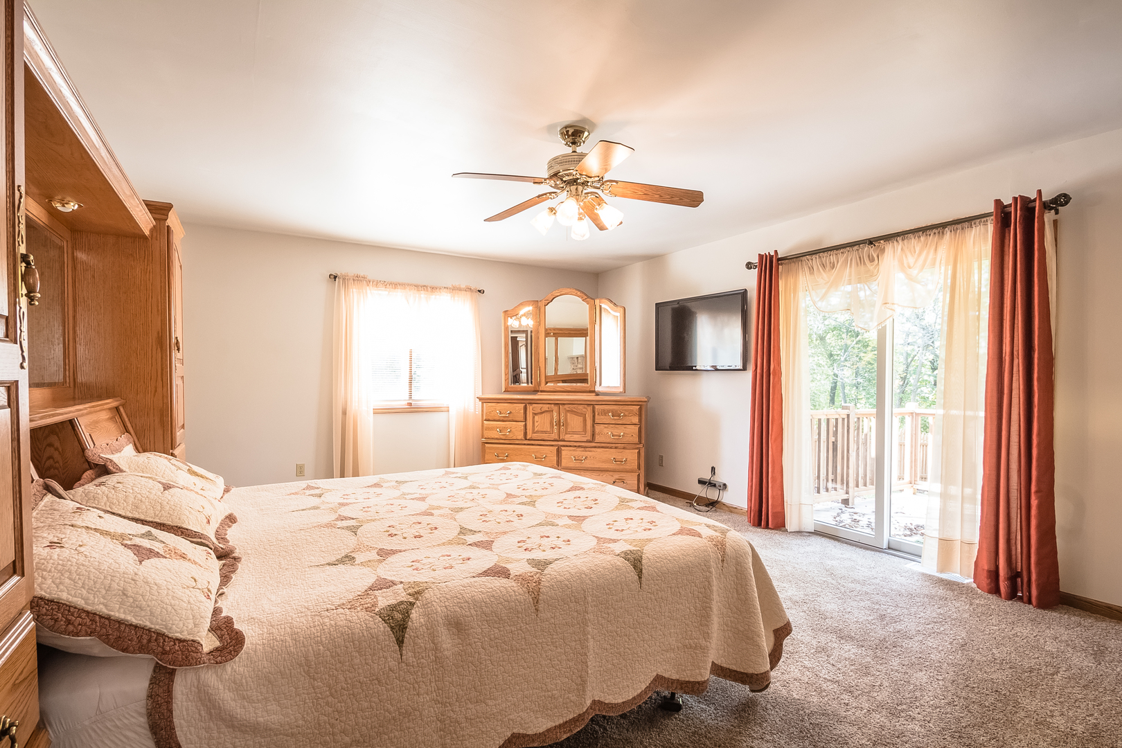 18802 West Manhattan Road Elwood, IL 60421 - Photo 16 of 38 a bedroom with a large bed and a window