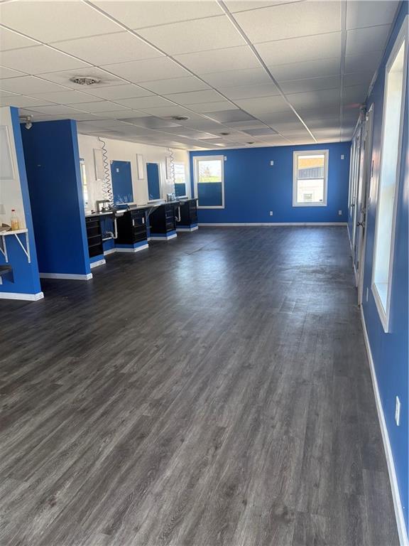 7710 Highway 30, Unit TOP Irwin, PA 15642 - Photo 4 of 9 a living room with furniture and wooden floor