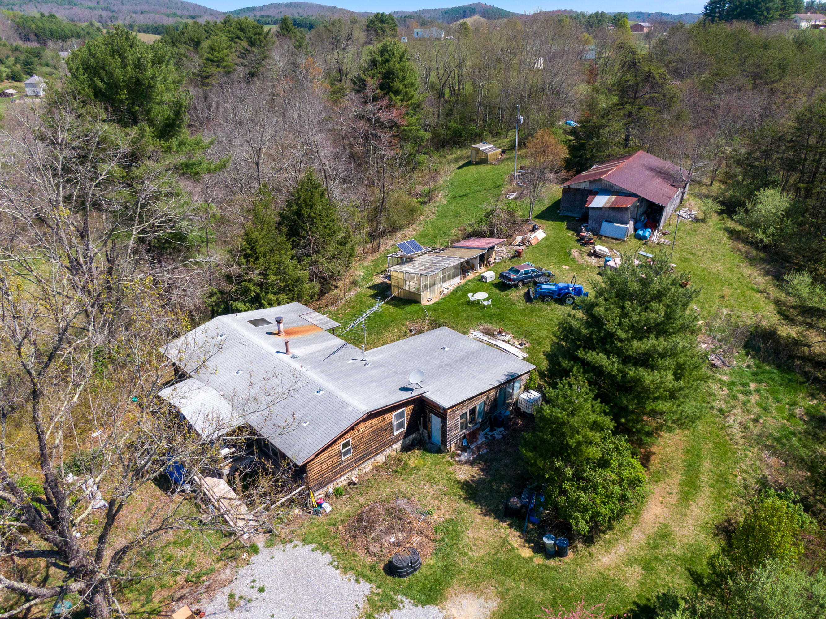 4610 Brush Creek Road Riner, VA 24149 - Photo 18 of 24 an aerial view of a house with yard and green space