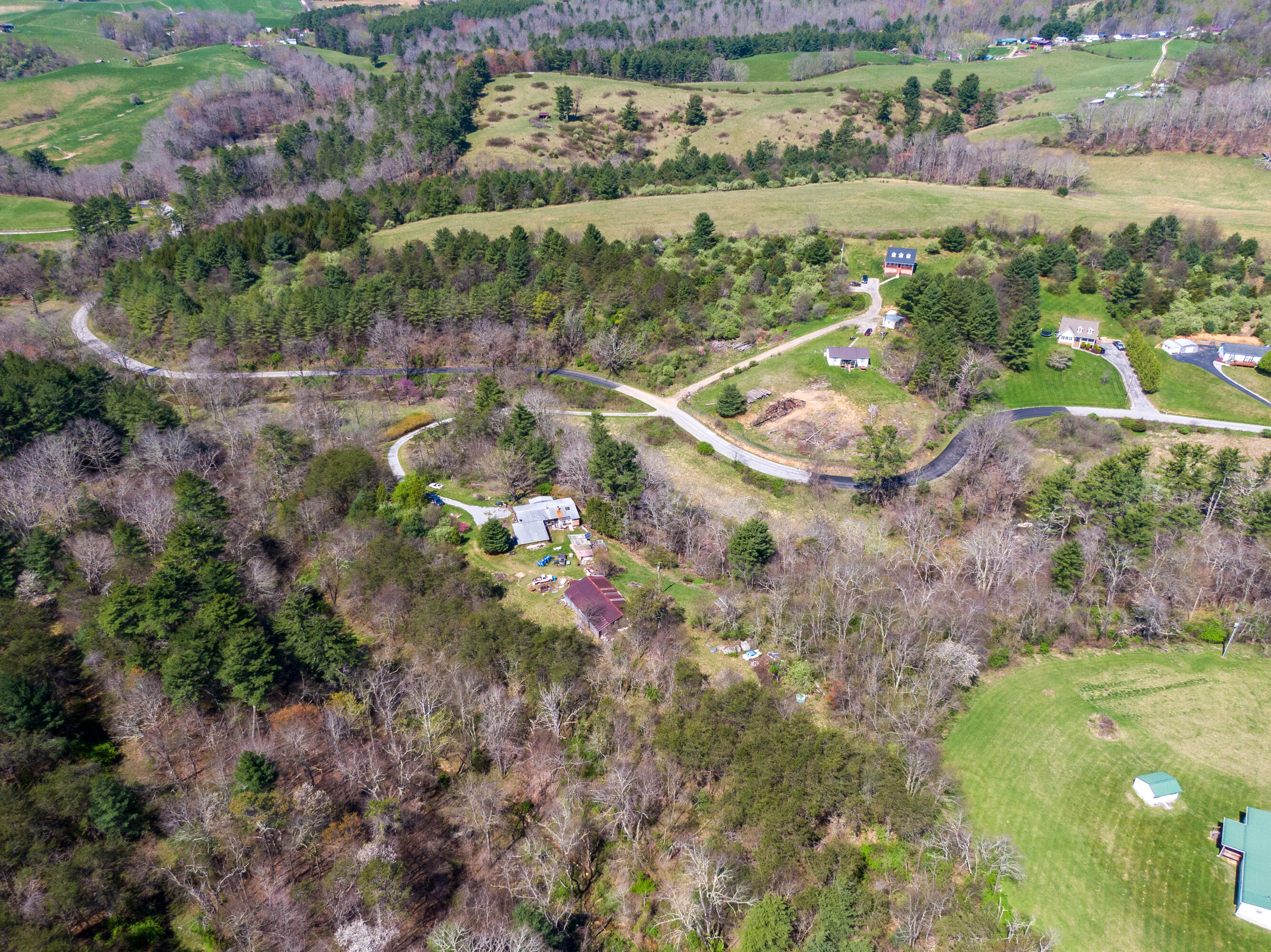 4610 Brush Creek Road Riner, VA 24149 - Photo 23 of 24 an aerial view of residential houses with outdoor space and trees