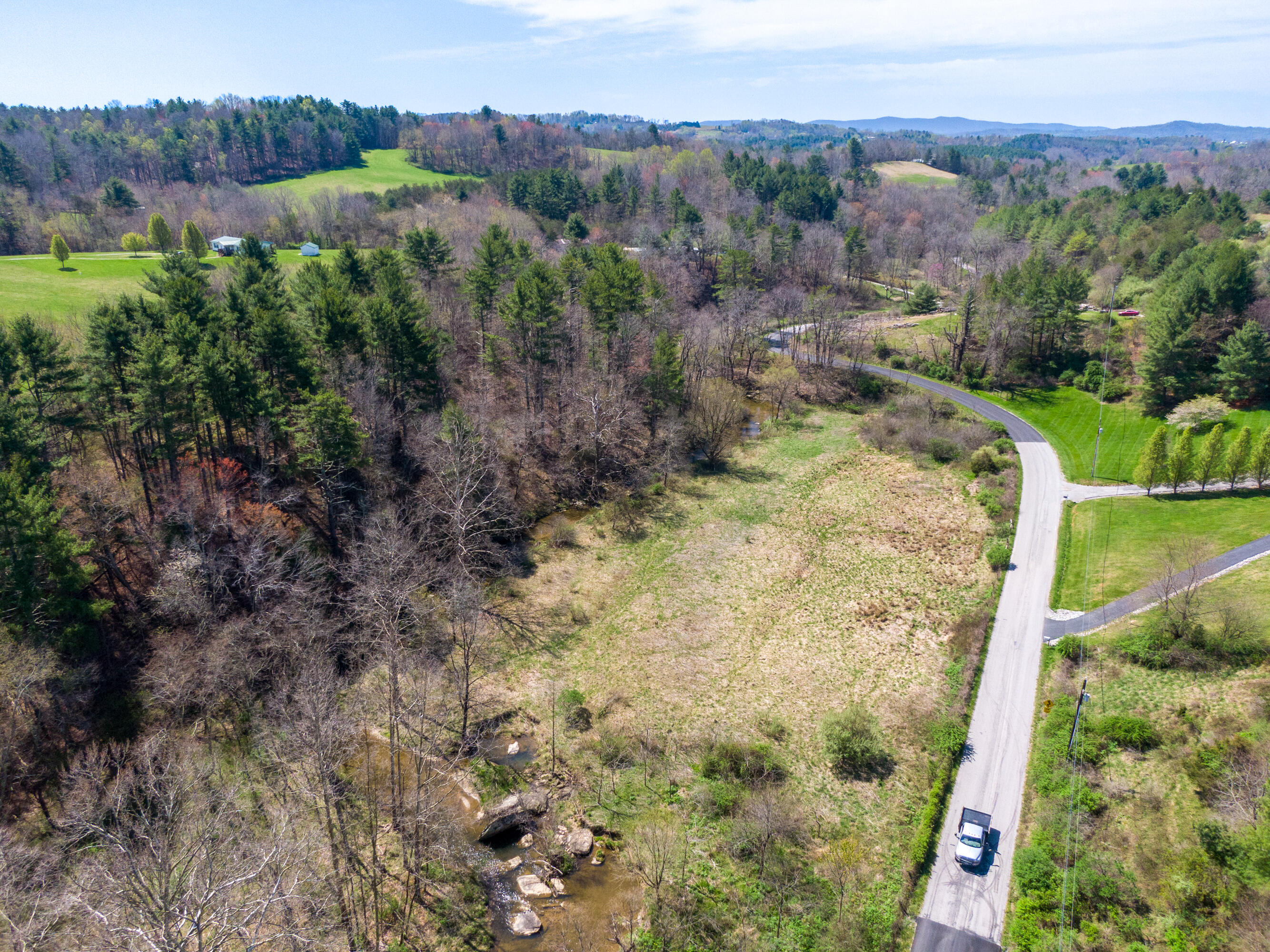4610 Brush Creek Road Riner, VA 24149 - Photo 10 of 24 an aerial view of a house with a yard