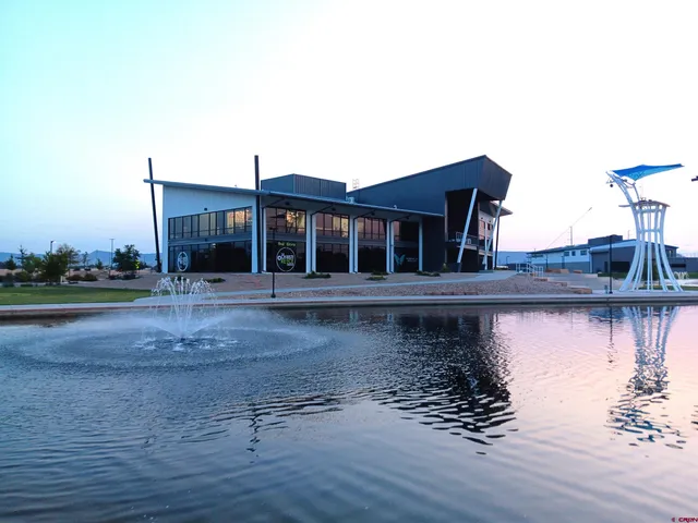 a view of a house with a lake view