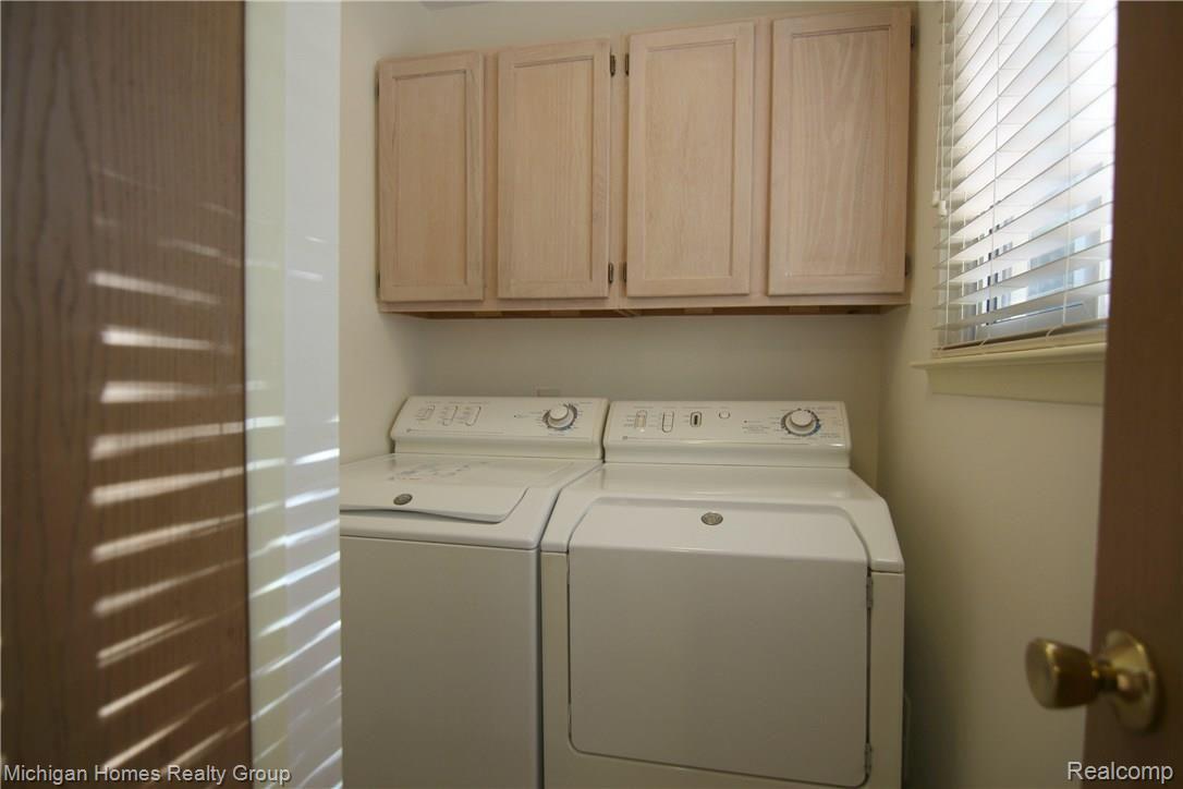 1410 Omega Road Walled Lake, MI 48390 - Photo 14 of 23 Omega Rd Laundry Room.jpg