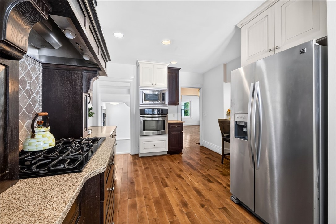 138 Dorchester Road Rochester, NY 14610 - Photo 18 of 41 Gorgeous Quartz Counters and cabinets & drawers galore & recessed lighting! Stainless Steel Appliances are included.