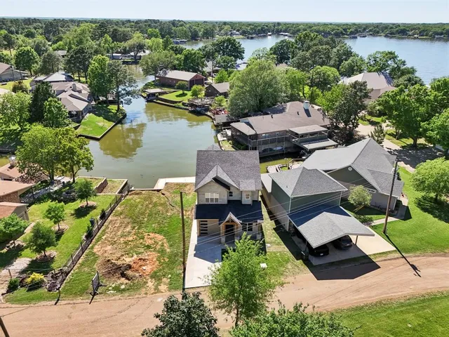 a view of lake with green space