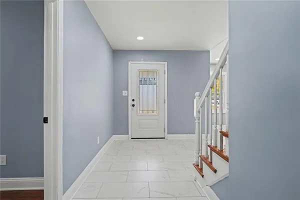 a view of an entryway with staircase