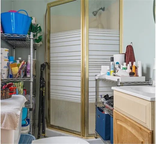 a kitchen with a sink and a refrigerator