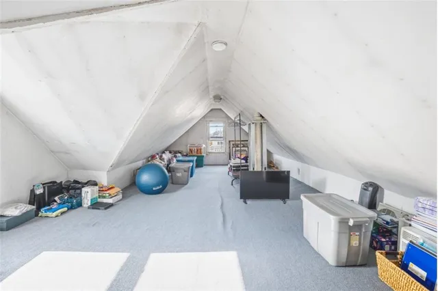 a view of livingroom with furniture and toys