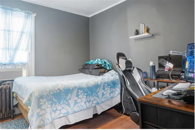 a bedroom with a bed and a table