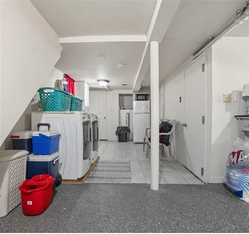 a view of a room with lots of furniture and garage