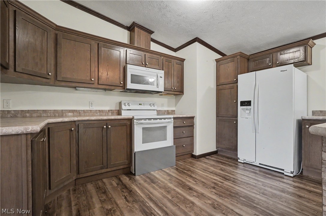 3424 Painesville Warren State Road Southington, OH 44470 - Photo 18 of 50 3424 Painesville Warren Rd, Southington, OH 44470 – Enjoy comfortable one-floor living in this well-maintained home built in 2018. Featuring 3 bedrooms, 2 full bathrooms, and an open-concept layout, this home offers both functionality and convenience. The spacious kitchen, dining, and living areas provide plenty of room for everyday living and entertaining. A large garage offers ample space for vehicles, storage, hobbies, or workshop needs. Situated on a generous lot with a welcoming front porch, this property combines modern living with a peaceful country setting. Move-in ready and waiting for its next owner!