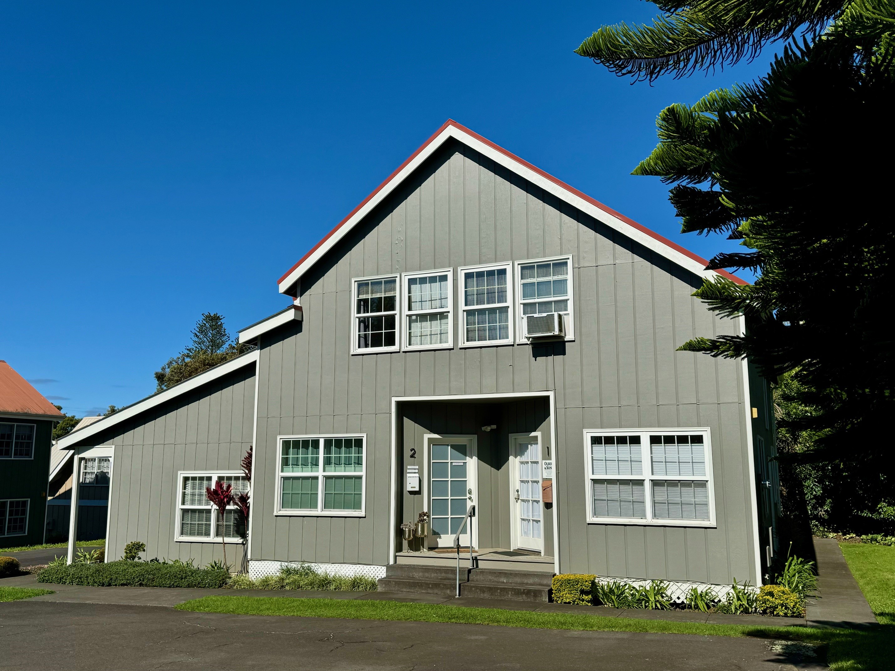 a view of a house with a yard