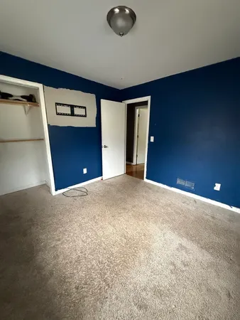 a view of a livingroom with an empty space