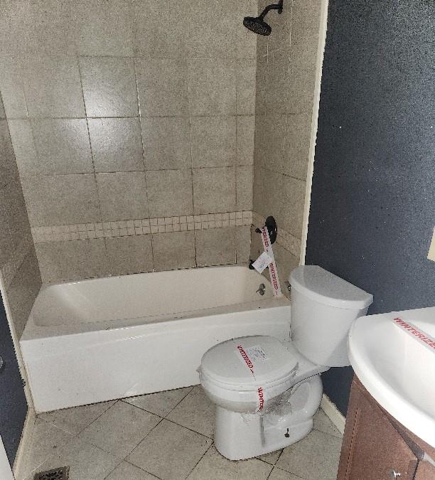 60 Zion Hill Road Marion, NC 28752 - Photo 19 of 19 a white bath tub sitting next to a white toilet and sink