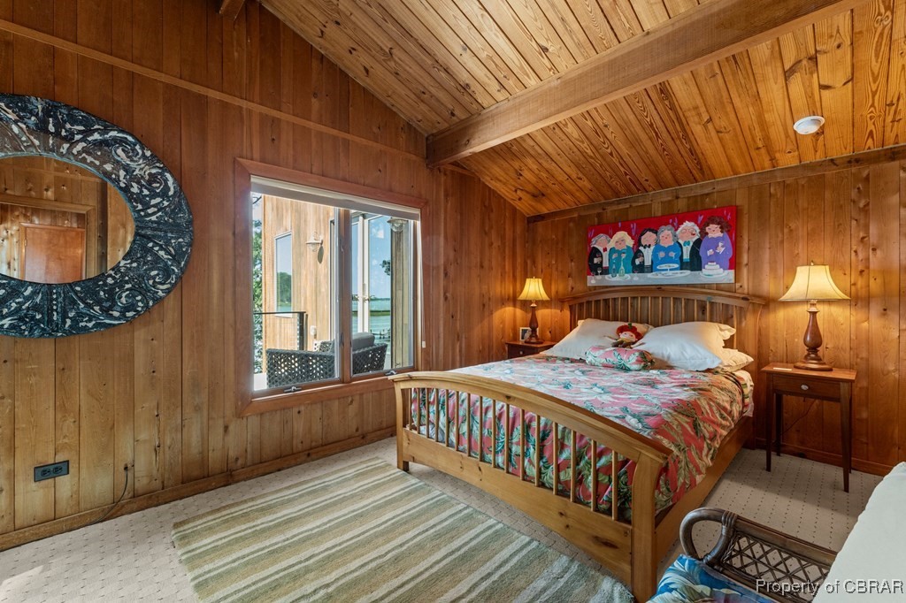 1106 Monarch Shores Road Kilmarnock, VA 22482 - Photo 29 of 44 Bedroom featuring wooden ceiling, wooden walls, and vaulted ceiling with beams