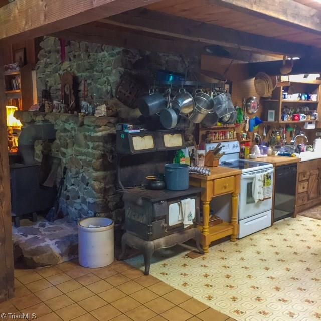 1519 Brim Road Madison, NC 27025 - Photo 13 of 26 Two wood stoves....one in kitchen and one in the great room