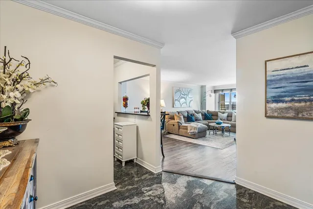 a bedroom with a bed and a view of closet