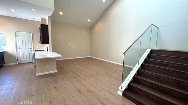 a room with stairs and furniture