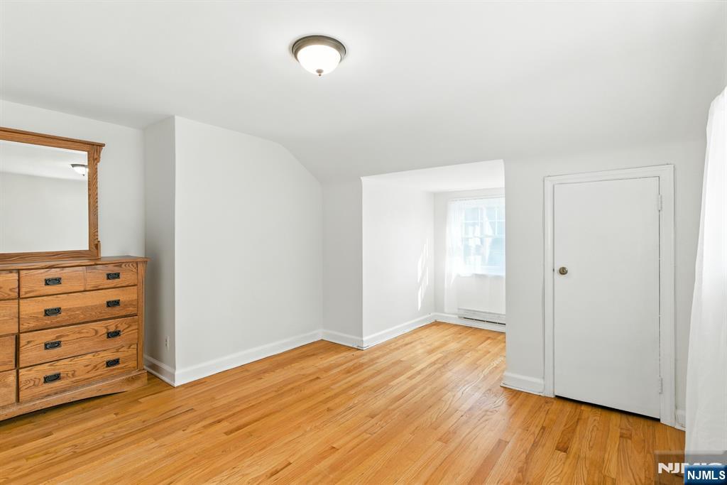 42 Meadow Lane Bloomfield, NJ 07003 - Photo 20 of 37 wooden floor in an empty room