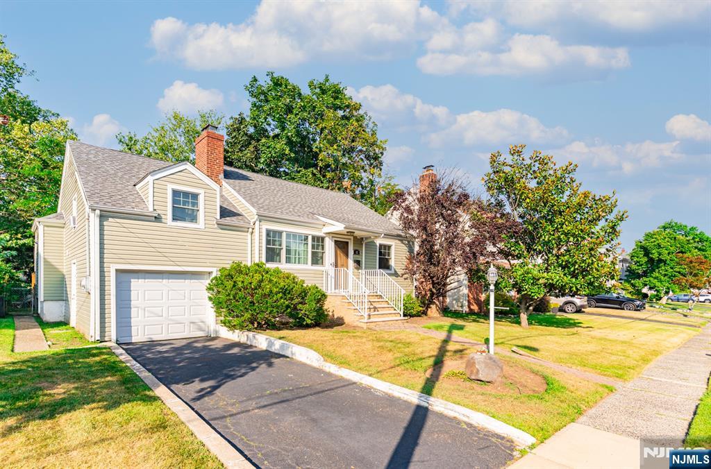 42 Meadow Lane Bloomfield, NJ 07003 - Photo 2 of 37 a front view of a house with yard and swimming pool