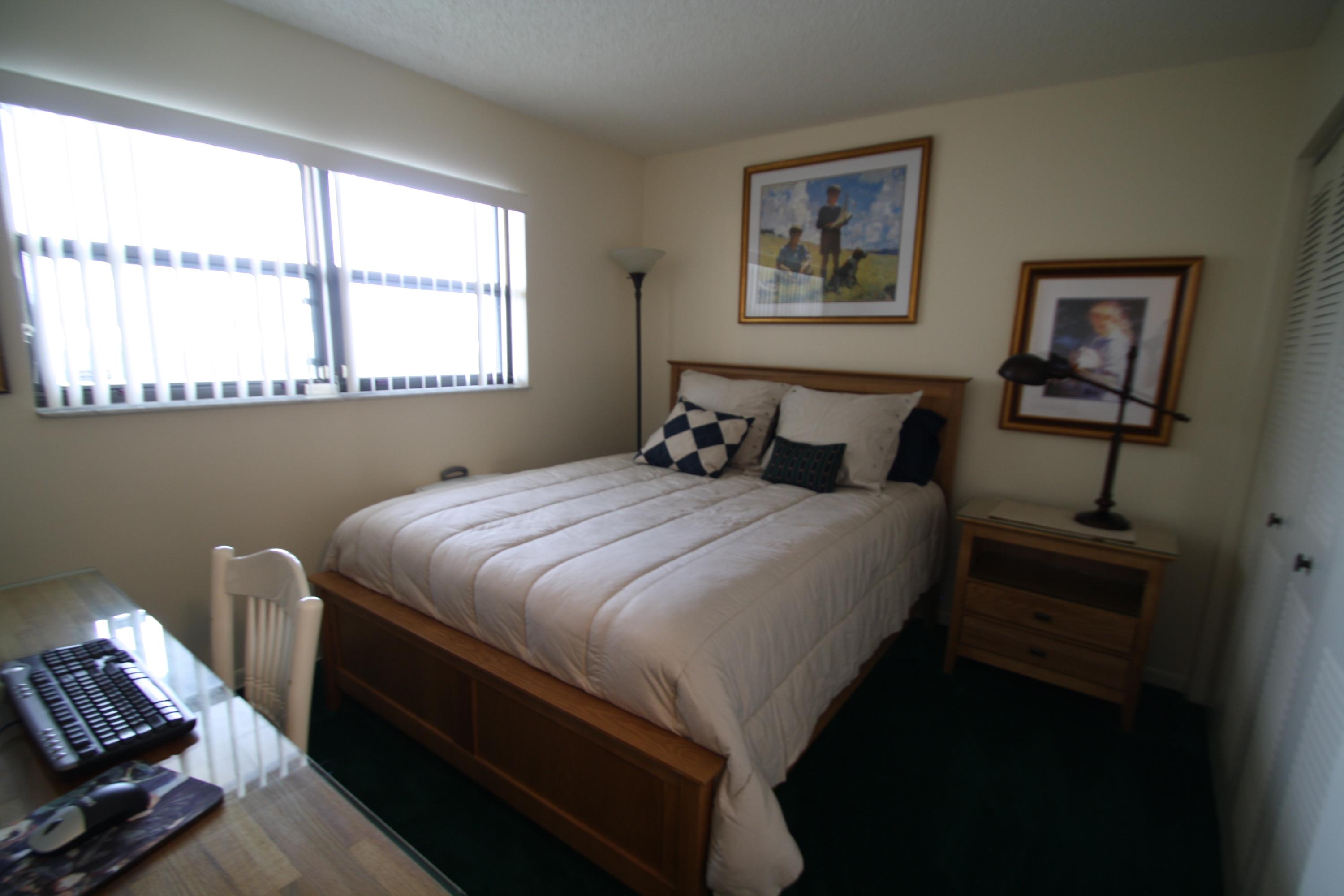 2141 Woolbright Road, Unit L206 Boynton Beach, FL 33426 - Photo 15 of 19 Guest Bedroom