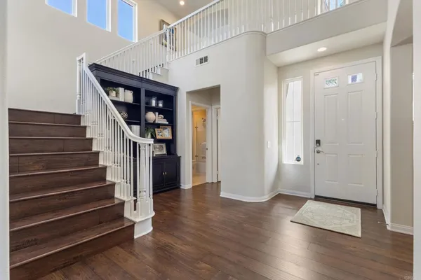 a living room with furniture and windows