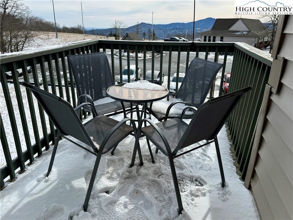 301 Pinnacle Inn Road, Unit 4303 Beech Mountain, NC 28604 - Photo 18 of 37 a view of a balcony with furniture
