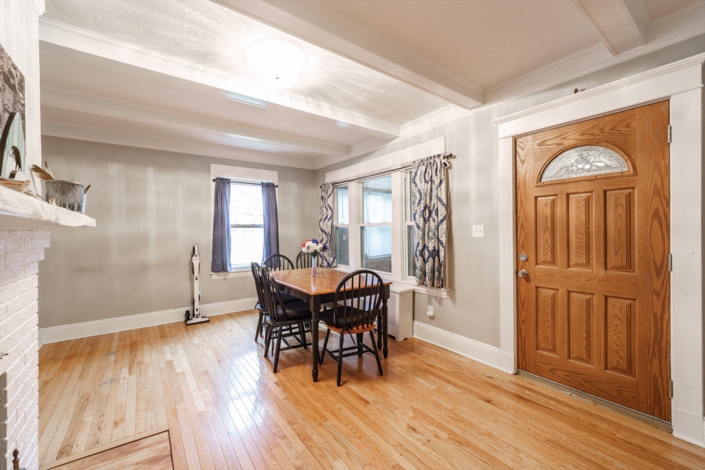 71 Daviston Street Springfield, MA 01108 - Photo 13 of 32 a view of a dining room with furniture window and wooden floor