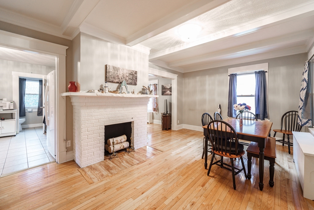 71 Daviston Street Springfield, MA 01108 - Photo 14 of 32 a view of a livingroom with furniture and a fireplace