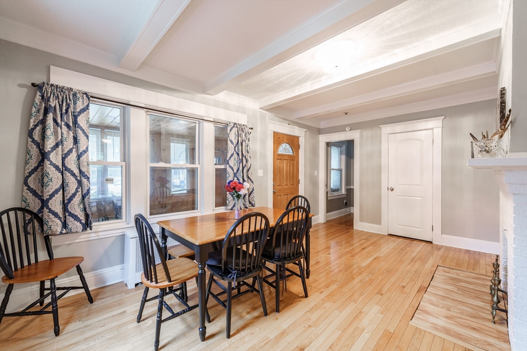 71 Daviston Street Springfield, MA 01108 - Photo 17 of 32 a view of a dining room with furniture and wooden floor