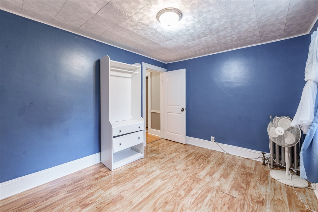 71 Daviston Street Springfield, MA 01108 - Photo 30 of 32 a view of a livingroom with wooden floor