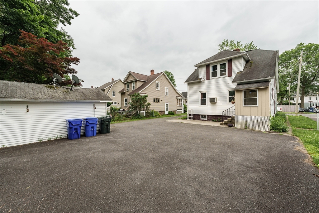 71 Daviston Street Springfield, MA 01108 - Photo 6 of 32 a view of a house with a park