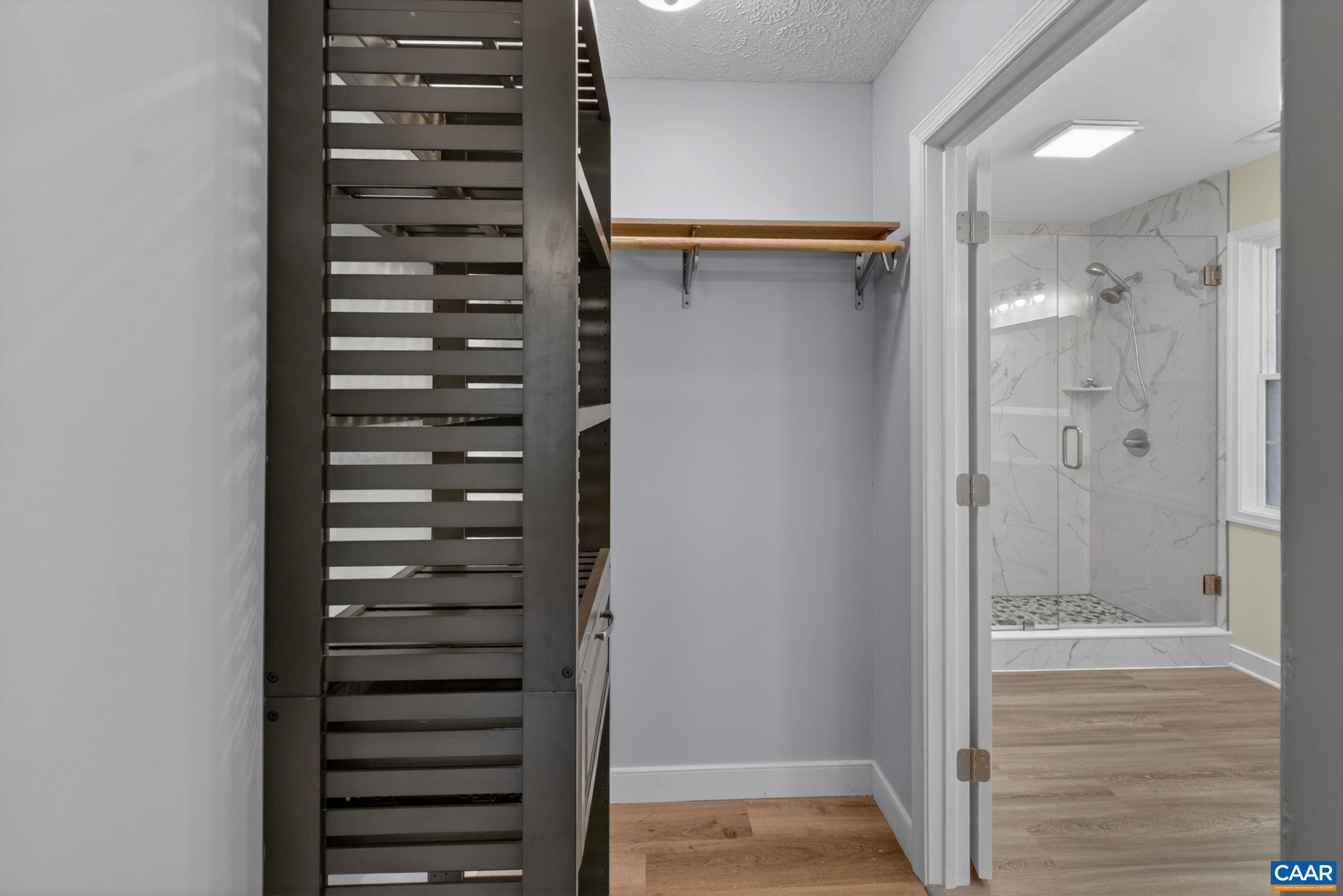 673 Cedar Lane Road Palmyra, VA 22963 - Photo 29 of 47 a view of closet with wooden floor