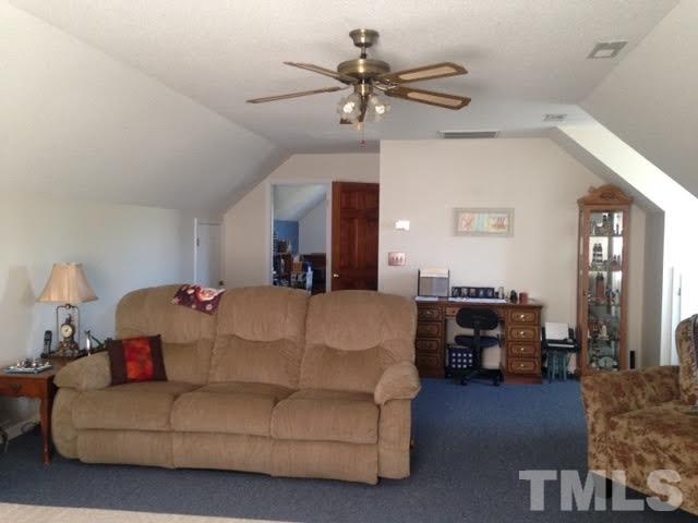 1386 Warren Road Dunn, NC 28334 - Photo 14 of 23 Upstairs room with walk in attic spaces