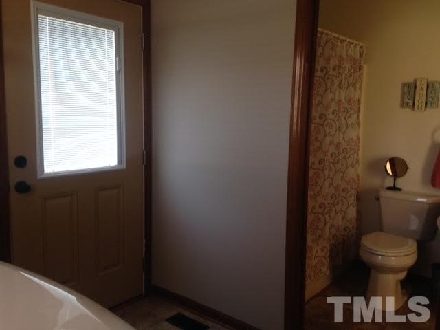 1386 Warren Road Dunn, NC 28334 - Photo 16 of 23 Laundry area with door to deck is nice.