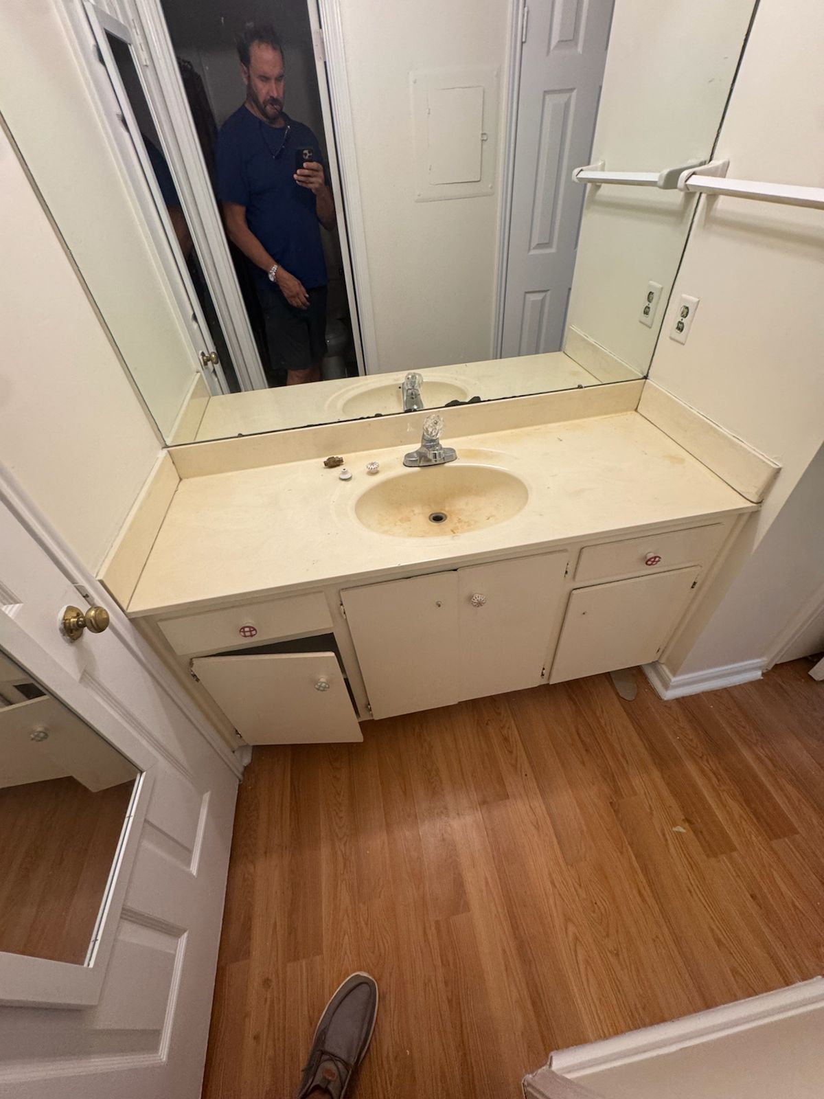 2529 Rio Grande Street, Unit 100 Austin, TX 78705 - Photo 13 of 14 a bathroom with a sink and a mirror