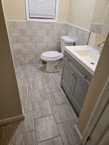 a bathroom with a sink and a toilet