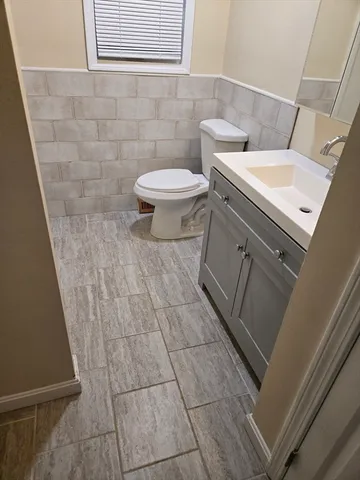 a bathroom with a sink and a toilet