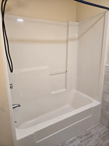 a bathroom with a bathtub