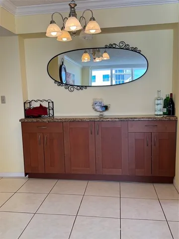 a kitchen with a cabinets and stove