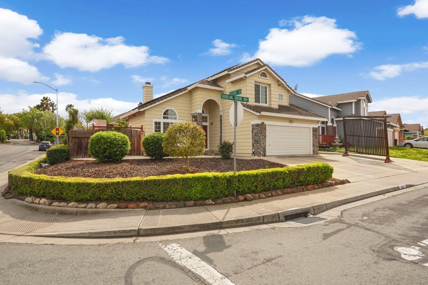 a house view with a garden space