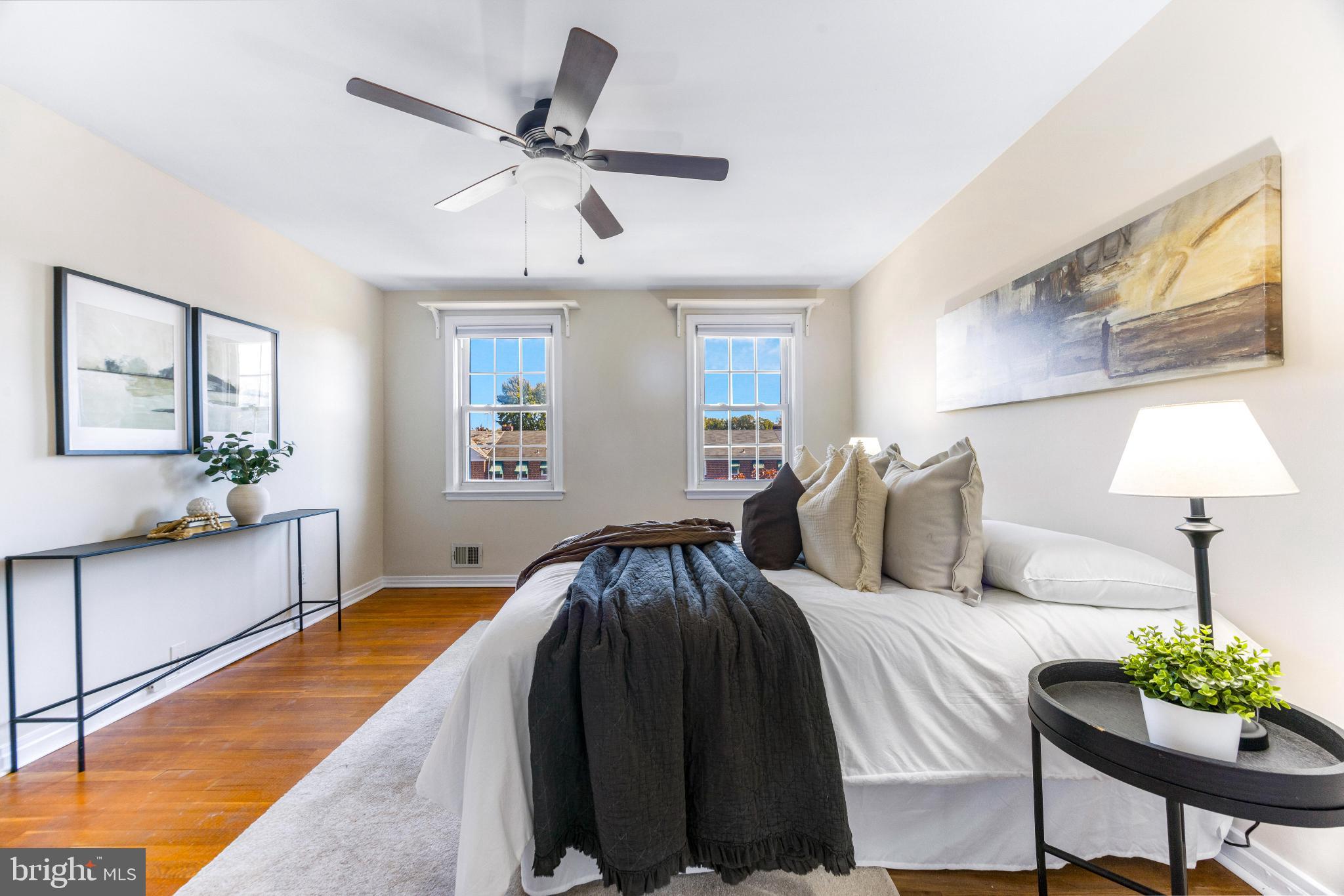 1815 Loch Shiel Road Towson, MD 21286 - Photo 13 of 32 a spacious bedroom with a bed and a chandelier