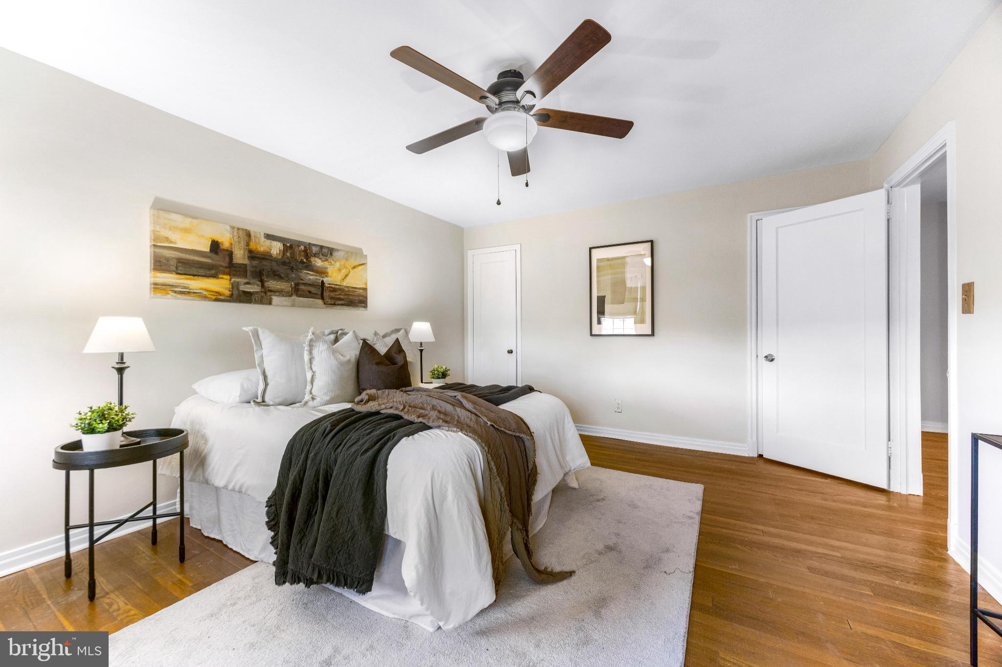 1815 Loch Shiel Road Towson, MD 21286 - Photo 14 of 32 a bed room with bed and a chandelier