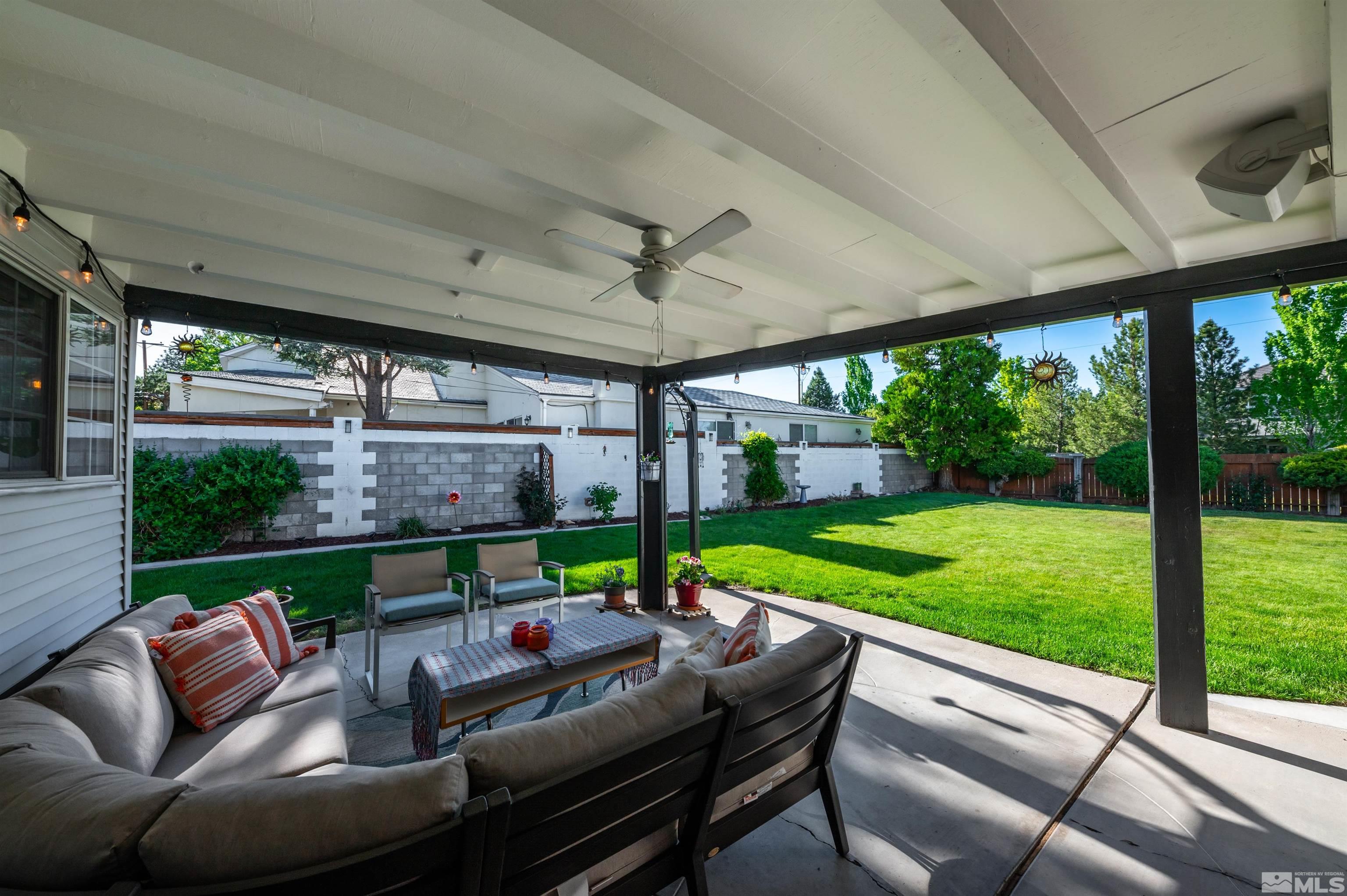 3901 Warren Way Reno, NV 89509 - Photo 25 of 40 a outdoor living space with furniture and garden view