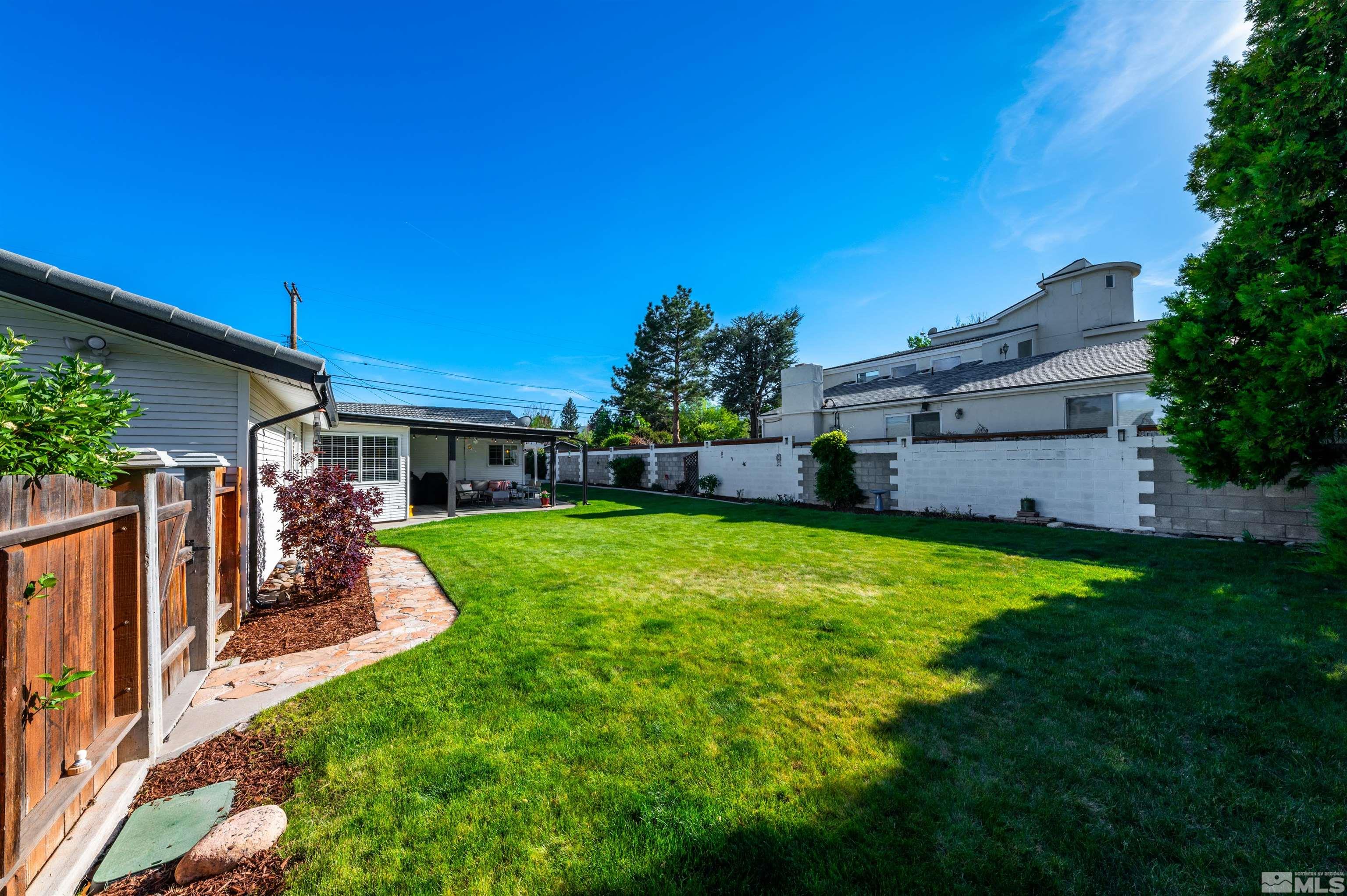 3901 Warren Way Reno, NV 89509 - Photo 28 of 40 a view of a house with a back yard
