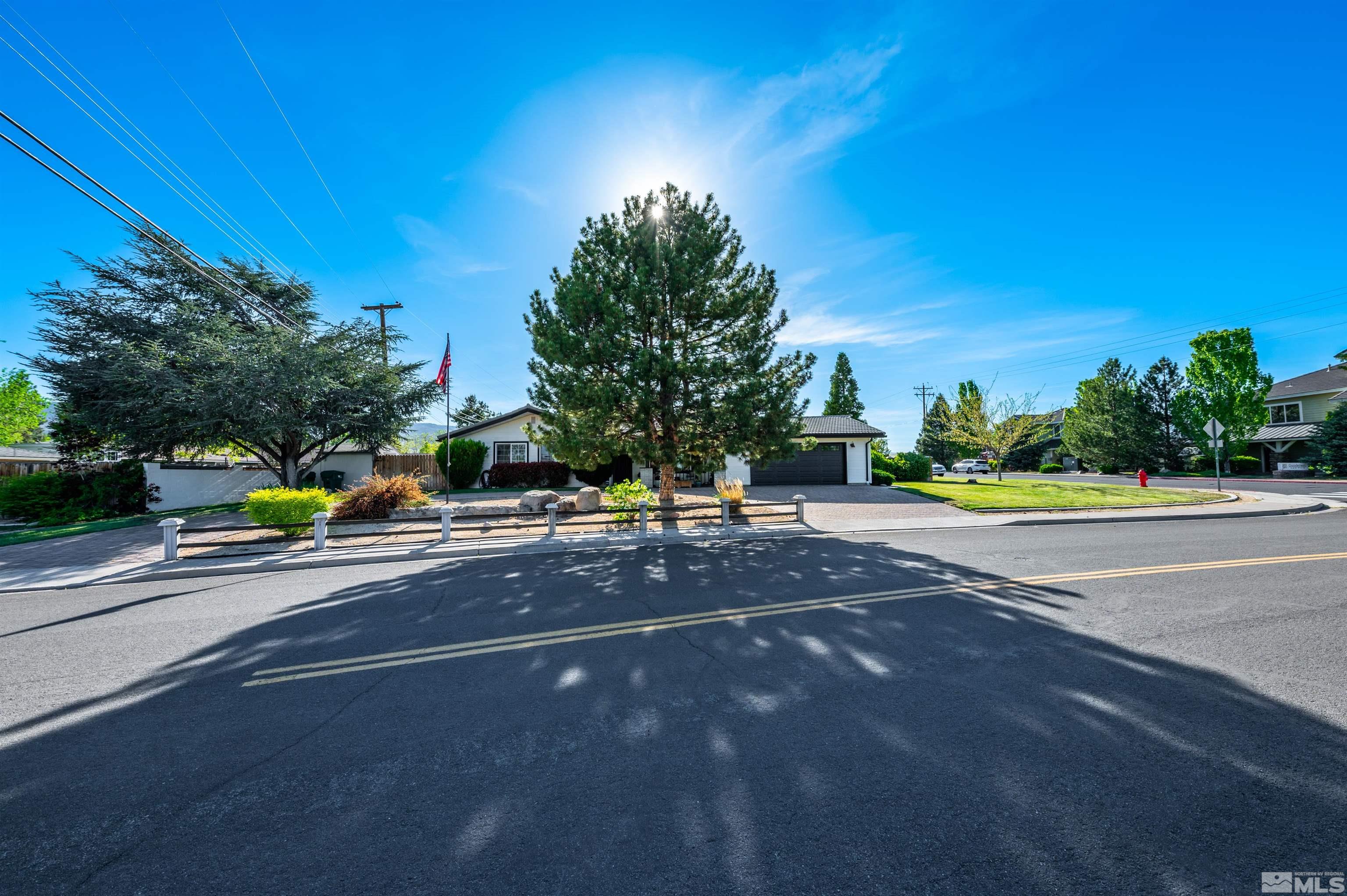 3901 Warren Way Reno, NV 89509 - Photo 3 of 40 a view of a street with houses